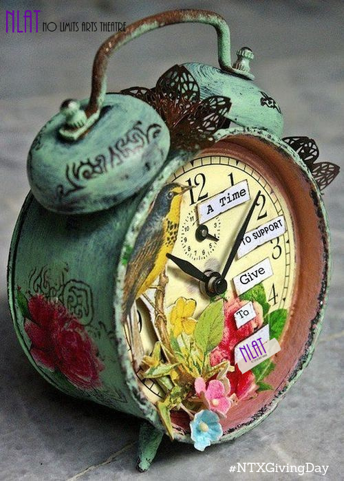 A vintage green alarm clock with twin bells on top, showing the time as 11:50, sitting on a concrete table.